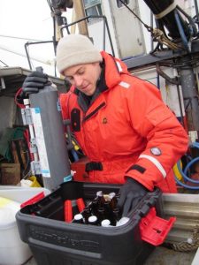 Jim Schloemer from the Kachemak Bay Research Reserve organizes bottled samples from Lower Cook Inlet to be sent to the Alutiiq Pride Shellfish Hatchery for analysis. 